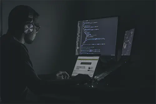 Operations control environment showing continuous monitoring of complex online platforms, risk signals, and system activity at scale